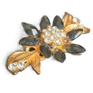Vintage floral gold toned Brooch with Black Glass petals and Rhinestone accents